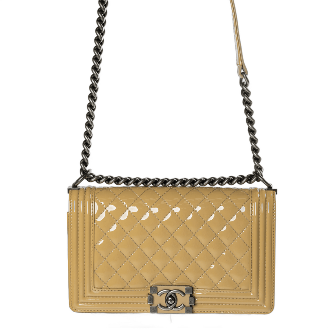 Chanel Medium Boy bag in beige patent finish, pre-owned, available at Gemaee