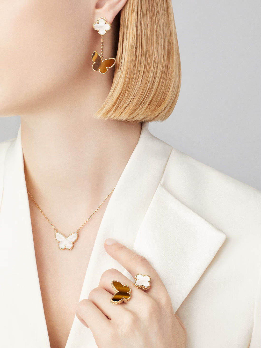 Van Cleef and Arpels Sweet Alhambra Butterfly Mother of Pearl & 18k Yellow Gold Pendant Necklace - Gemaee  UAE