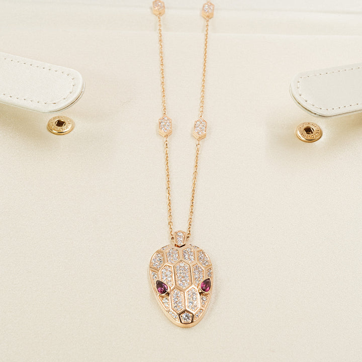 Bulgari Serpenti Necklace in 18K Rose Gold with Pavé Diamonds and Rubellite Eyes - Gemaee  UAE