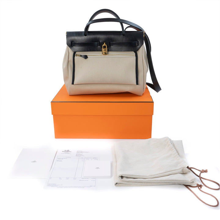 Hermès Herbag Zip 31 Retourne Bag in Béton Canvas with Noir Veau Bétis Leather Trim and Gold Hardware