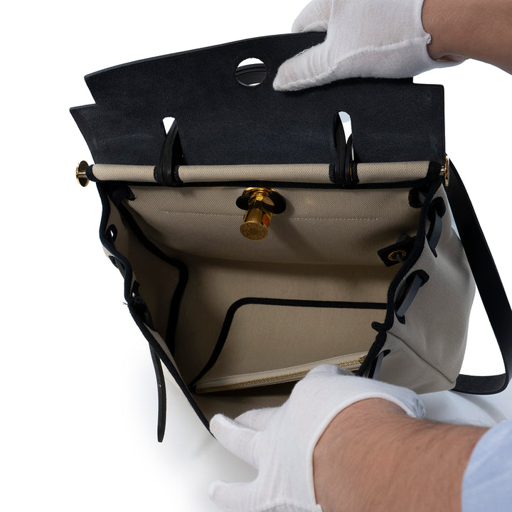Hermès Herbag Zip 31 Retourne Bag in Béton Canvas with Noir Veau Bétis Leather Trim and Gold Hardware