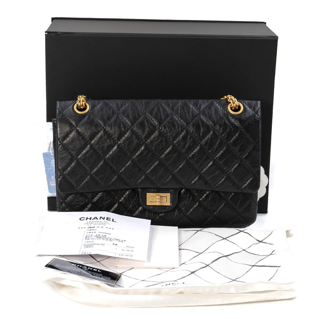 Chanel 2.55 Handbag in Black Aged Calfskin with Gold Tone Metal Hardware