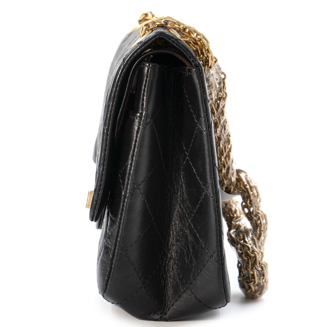 Chanel 2.55 Handbag in Black Aged Calfskin with Gold Tone Metal Hardware