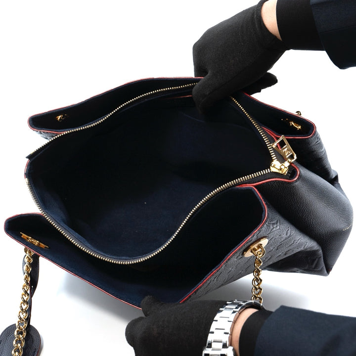 Louis Vuitton Surène MM in navy blue Monogram Empreinte leather