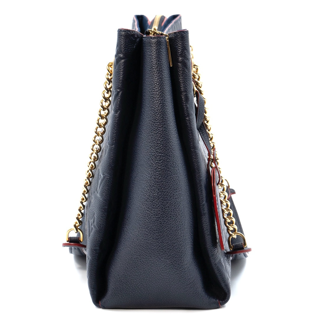 Louis Vuitton Surène MM in navy blue Monogram Empreinte leather
