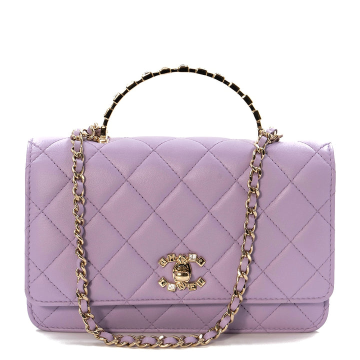 Chanel Mini Flap Bag With Handle in purple lambskin leather with champagne gold hardware