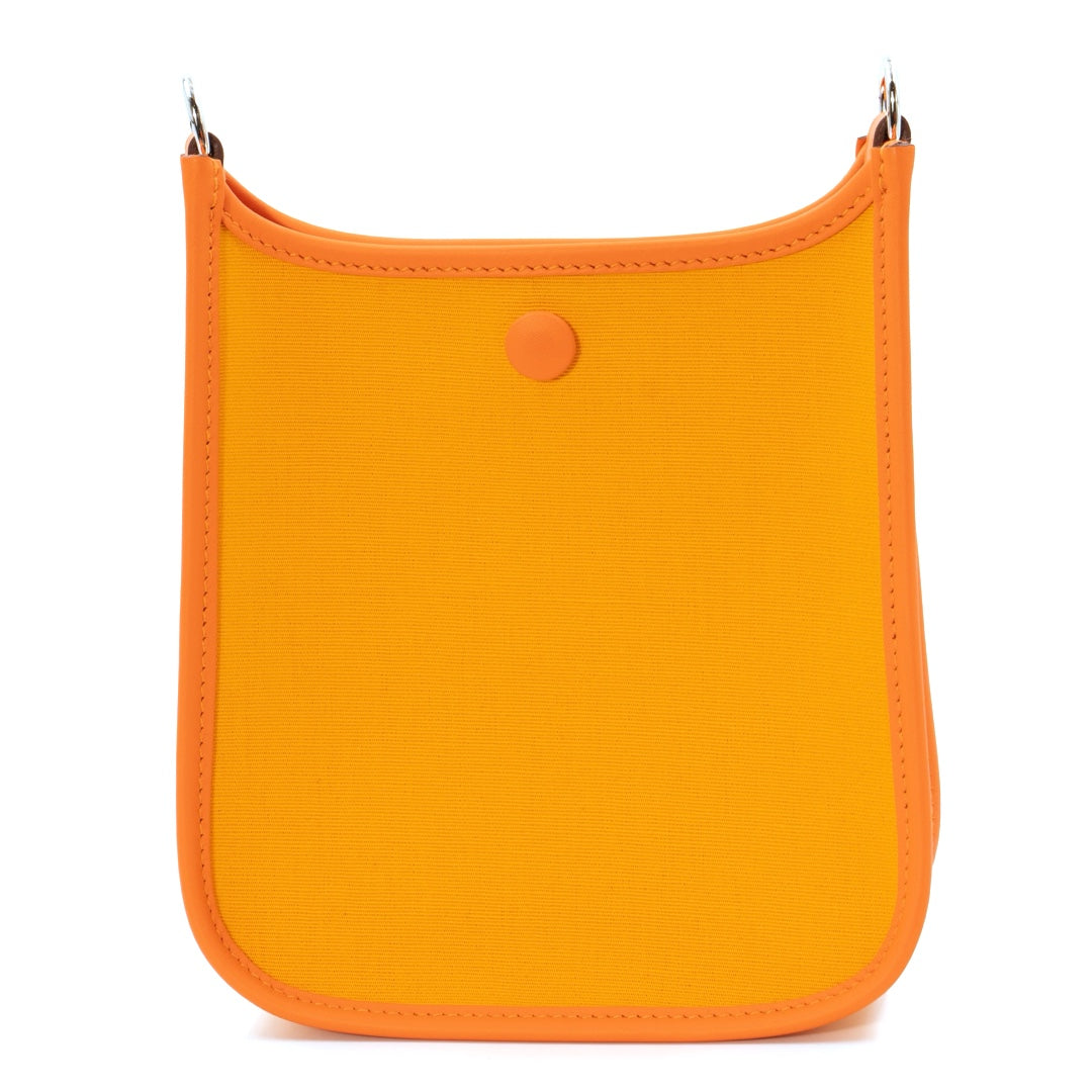 Hermès Neo Evelyne TPM Bag in Feu & Jaune d’Or Toile Officier with Swift Leather Trim and Palladium Hardware