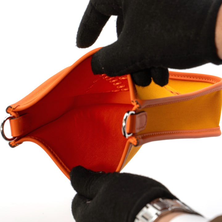 Hermès Neo Evelyne TPM Bag in Feu & Jaune d’Or Toile Officier with Swift Leather Trim and Palladium Hardware