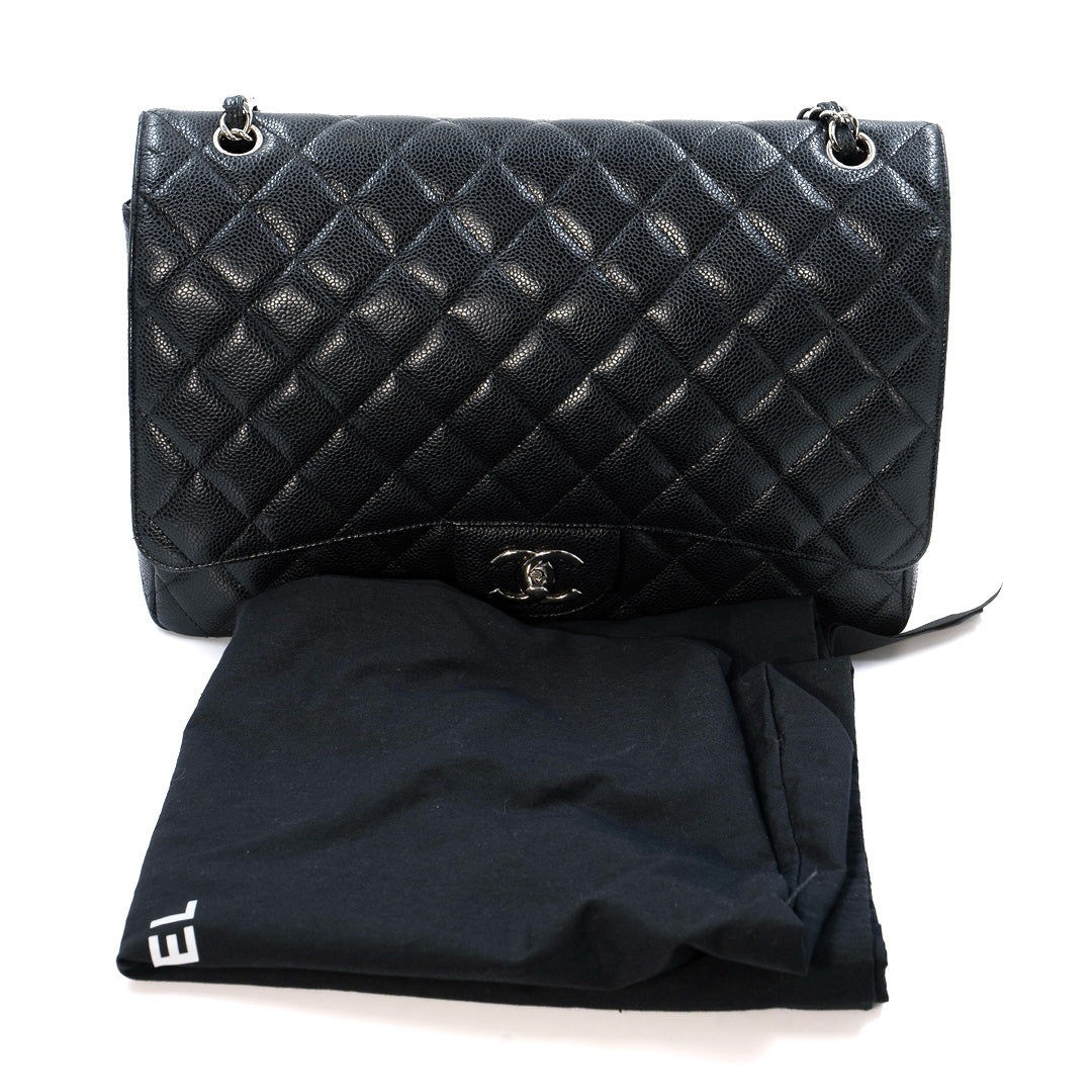 Chanel Black Maxi Classic Caviar Double Flap bag with silver-tone hardware