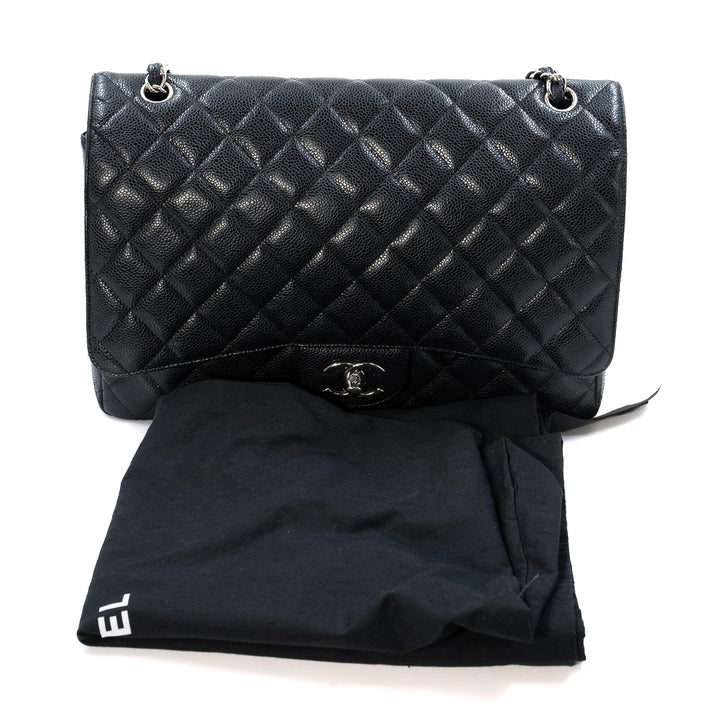 Chanel Black Maxi Classic Caviar Double Flap bag with silver-tone hardware