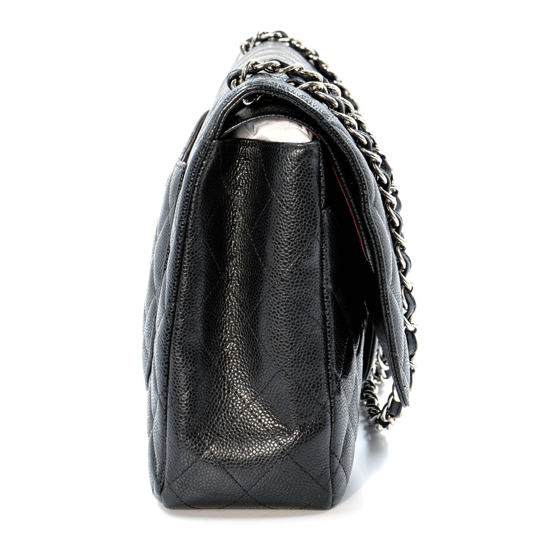 Chanel Black Maxi Classic Caviar Double Flap bag with silver-tone hardware