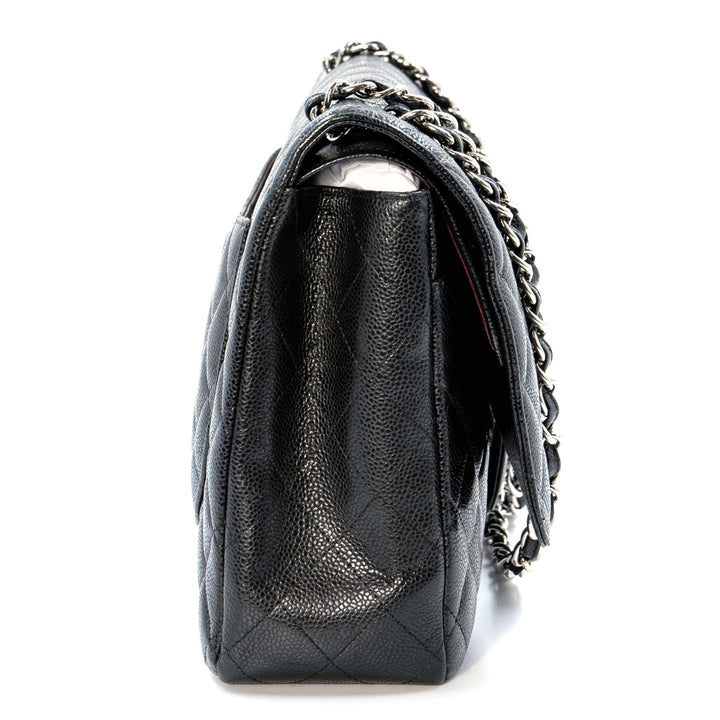 Chanel Black Maxi Classic Caviar Double Flap bag with silver-tone hardware