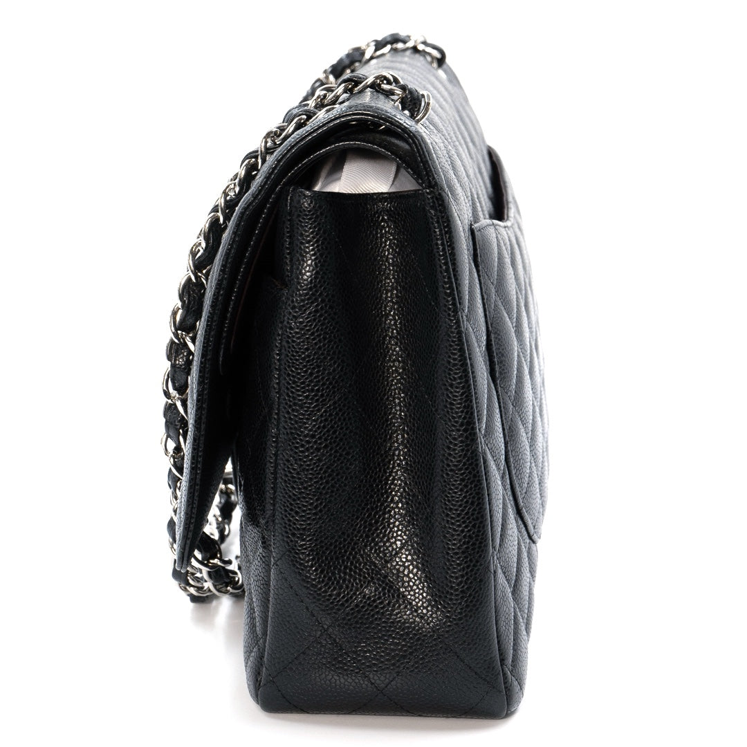 Chanel Black Maxi Classic Caviar Double Flap bag with silver-tone hardware