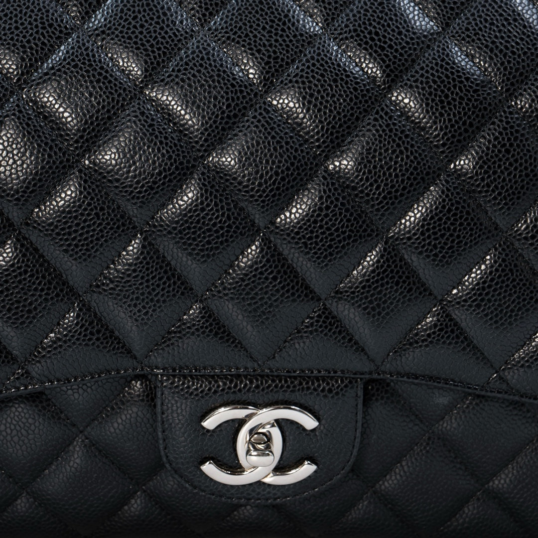 Chanel Black Maxi Classic Caviar Double Flap bag with silver-tone hardware