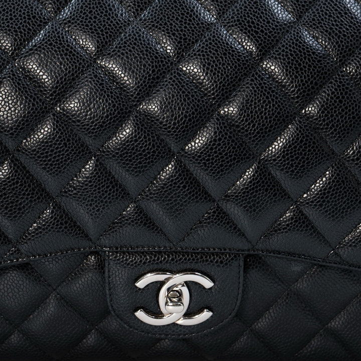 Chanel Black Maxi Classic Caviar Double Flap bag with silver-tone hardware