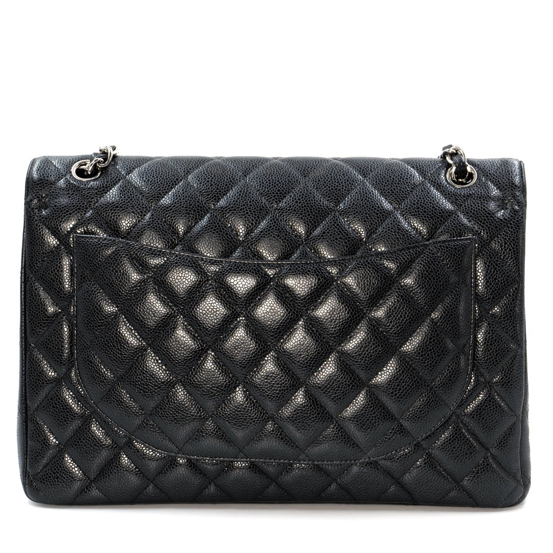 Chanel Black Maxi Classic Caviar Double Flap bag with silver-tone hardware
