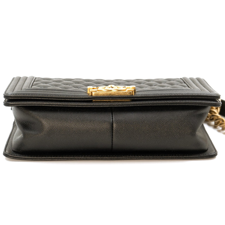 Chanel Boy Medium flap bag in black quilted caviar leather with gold tone hardware