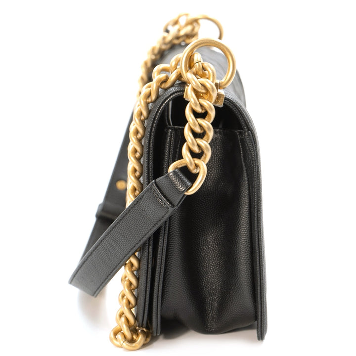 Chanel Boy Medium flap bag in black quilted caviar leather with gold tone hardware