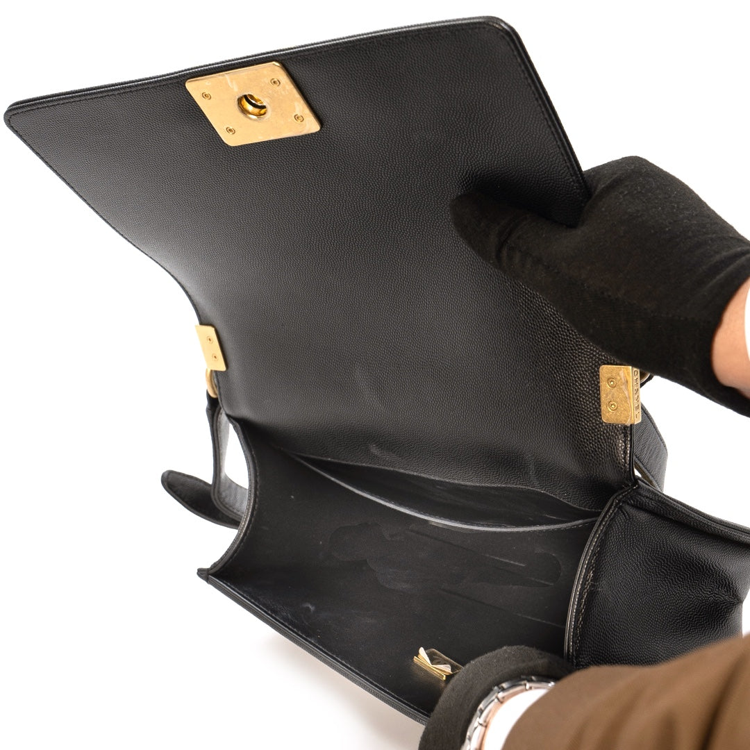 Chanel Boy Medium flap bag in black quilted caviar leather with gold tone hardware