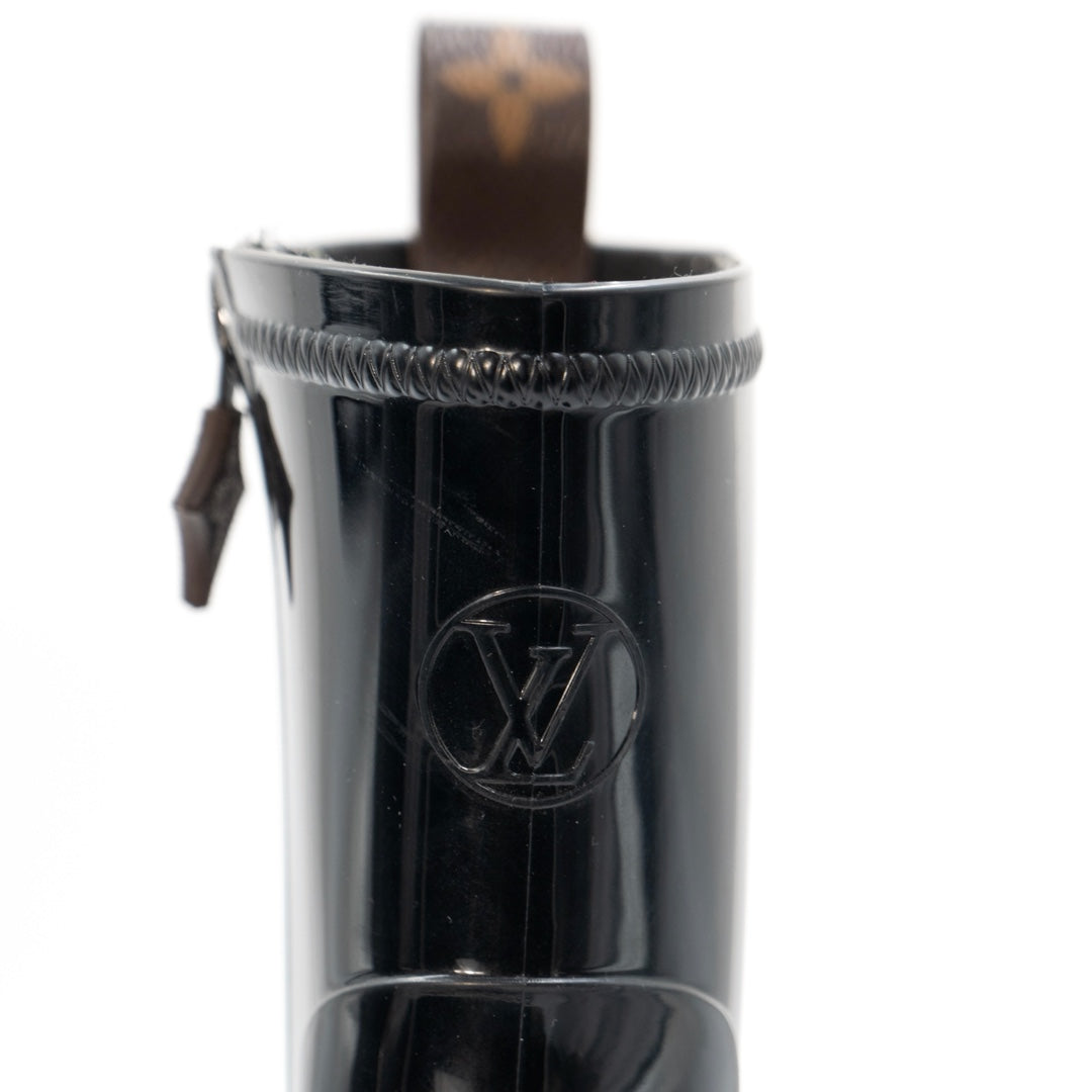 Louis Vuitton Silhouette Line Ankle Boots in black rubber with a monogram flower-shaped heel