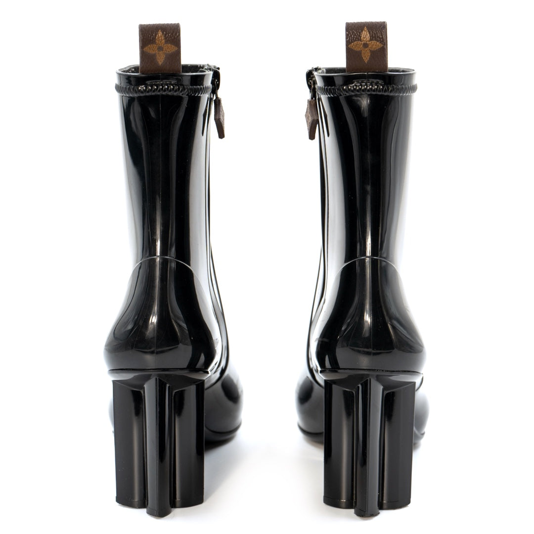 Louis Vuitton Silhouette Line Ankle Boots in black rubber with a monogram flower-shaped heel