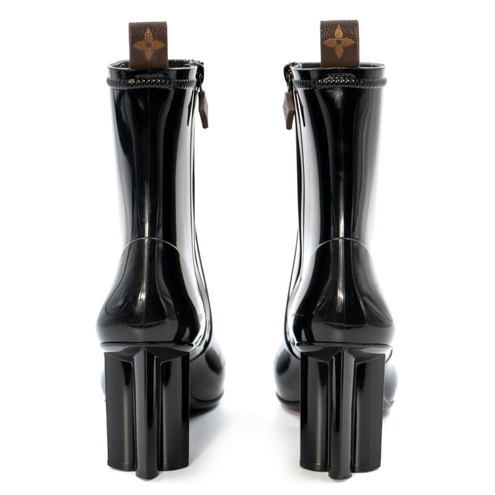 Louis Vuitton Silhouette Line Ankle Boots in black rubber with a monogram flower-shaped heel