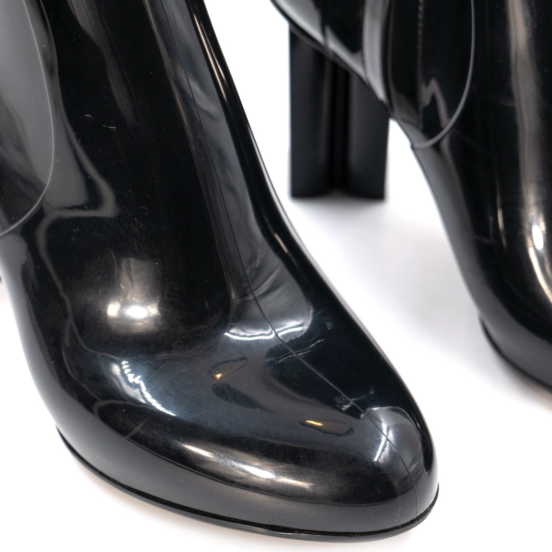 Louis Vuitton Silhouette Line Ankle Boots in black rubber with a monogram flower-shaped heel