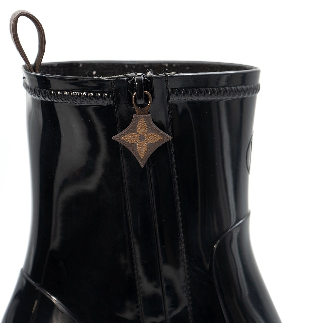 Louis Vuitton Silhouette Line Ankle Boots in black rubber with a monogram flower-shaped heel