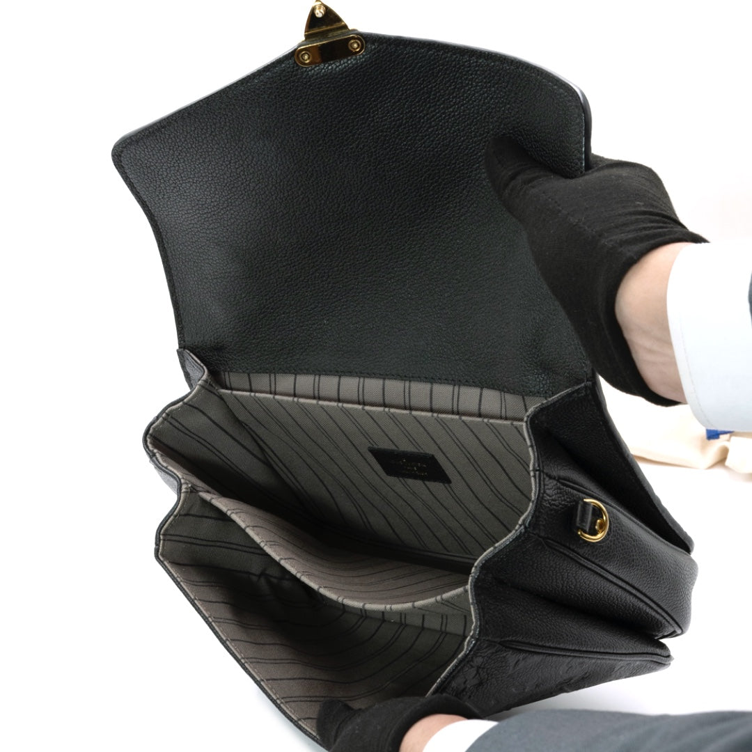 Louis Vuitton Pochette Metis bag in black Monogram Empreinte leather with gold-tone hardware - Gemaee  UAE