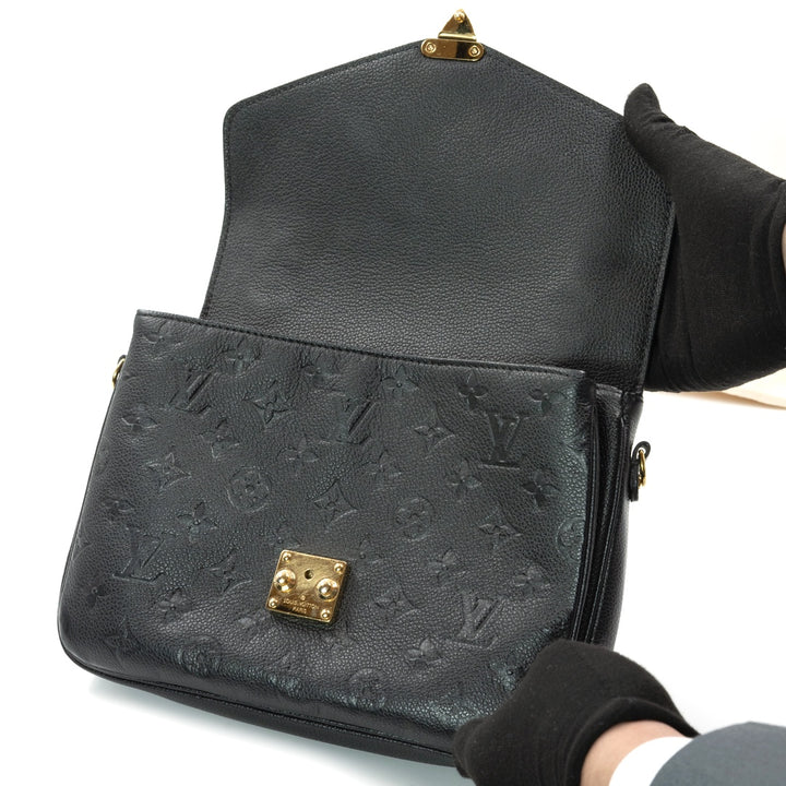 Louis Vuitton Pochette Metis bag in black Monogram Empreinte leather with gold-tone hardware - Gemaee  UAE