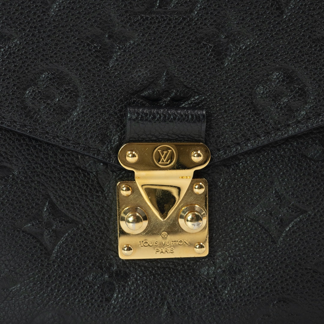 Louis Vuitton Pochette Metis bag in black Monogram Empreinte leather with gold-tone hardware - Gemaee  UAE