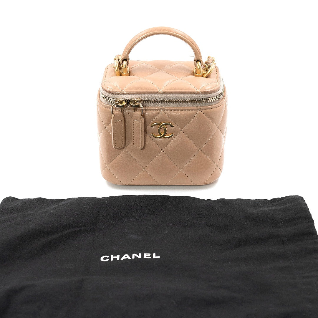 Chanel Mini Vanity Case with Chain in Beige Lambskin Leather with Gold Hardware - Gemaee  UAE