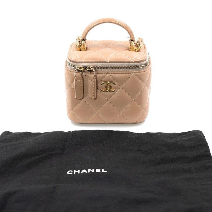 Chanel Mini Vanity Case with Chain in Beige Lambskin Leather with Gold Hardware - Gemaee  UAE