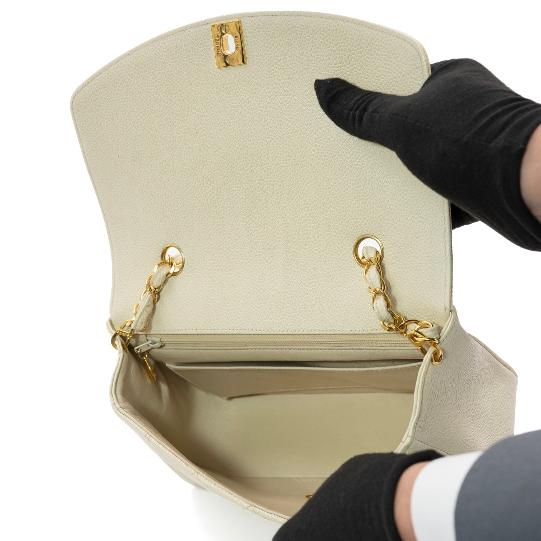 Chanel Vintage Small Diana Flap Bag in Ivory Quilted Caviar Leather with Gold Hardware - Gemaee  UAE