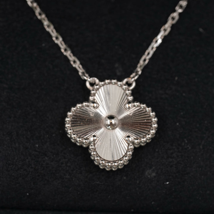 Van Cleef & Arpels Vintage Alhambra Guilloché Pendant 18K White Gold - Gemaee  UAE