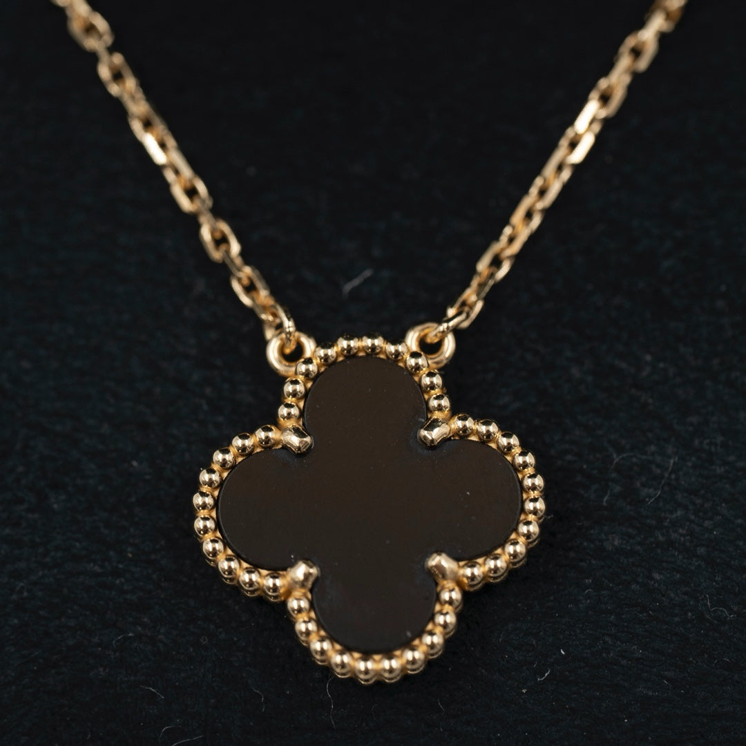 Van Cleef & Arpels Vintage Alhambra Pendant 18K Yellow Gold & Black Onyx - Gemaee  UAE