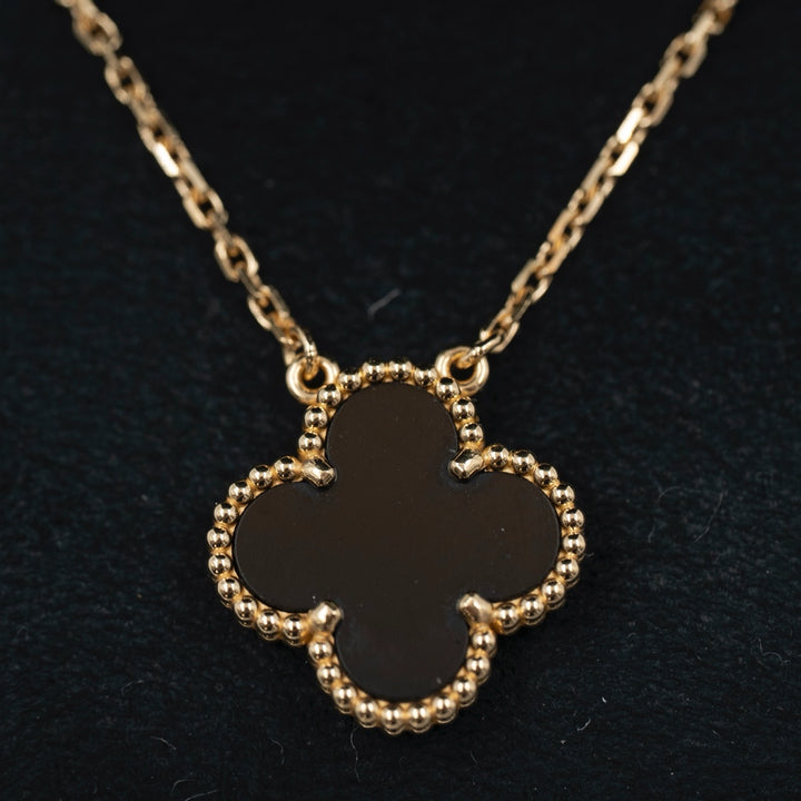 Van Cleef & Arpels Vintage Alhambra Pendant 18K Yellow Gold & Black Onyx - Gemaee  UAE