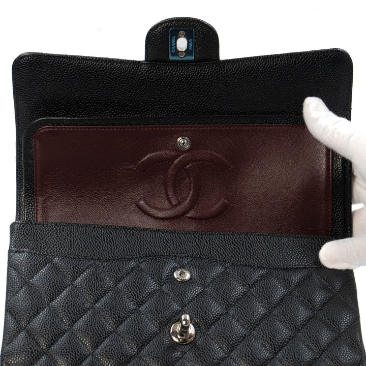 Chanel Medium Classic Double Flap Bag in Black Caviar Leather with Silver Hardware - Gemaee  UAE