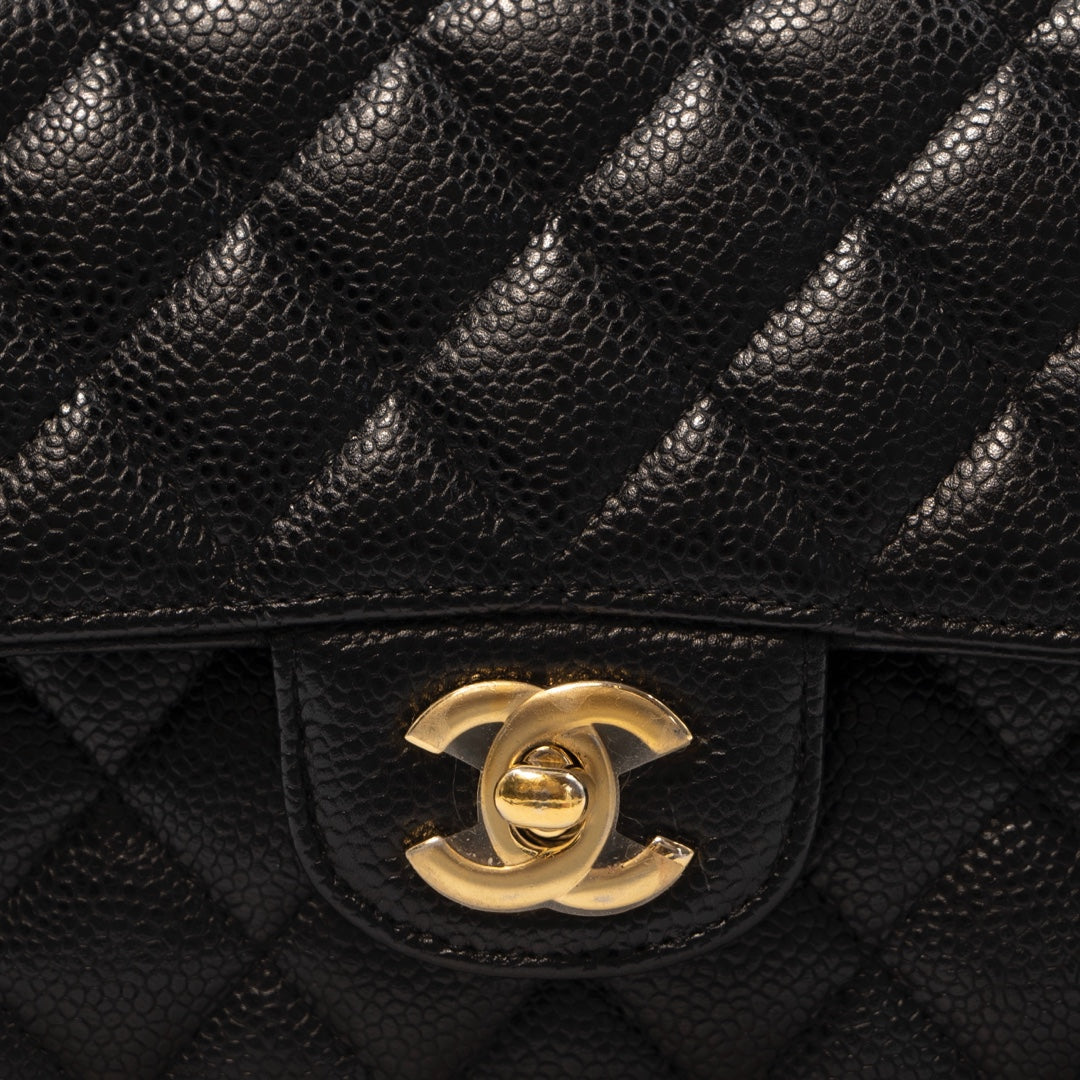 Chanel Medium Classic Double Flap Bag in Black Caviar Leather with Gold Hardware - Gemaee  UAE