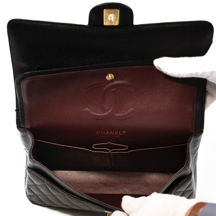 Chanel Medium Classic Double Flap Bag in Black Caviar Leather with Gold Hardware - Gemaee  UAE
