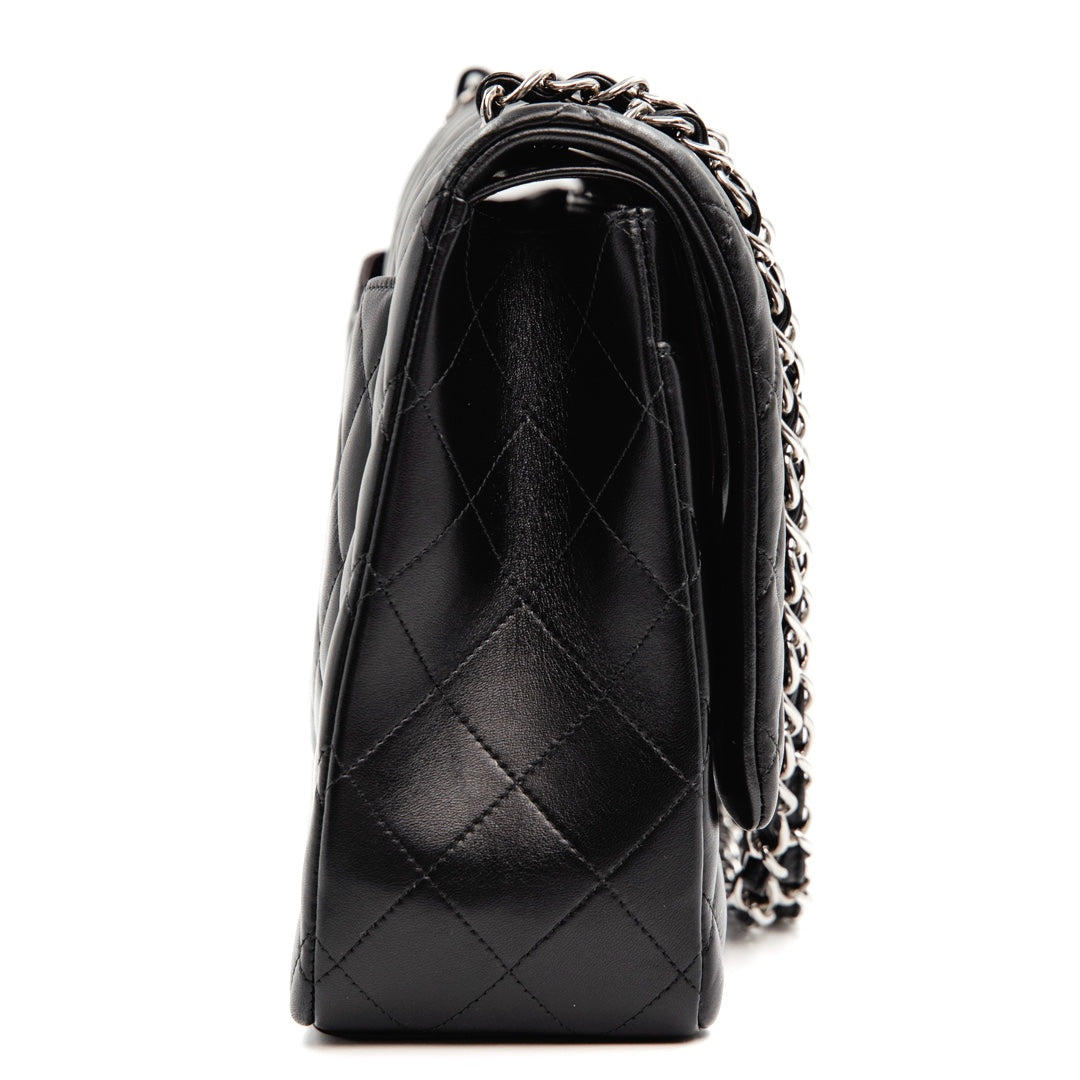 Chanel Black Quilted Lambskin Leather Classic Maxi Double Flap Bag - Gemaee  UAE