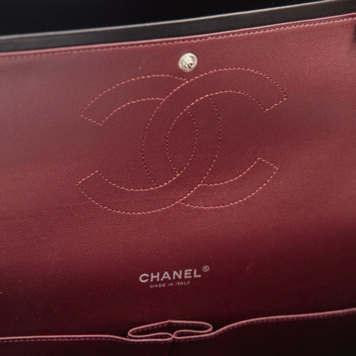 Chanel Black Quilted Lambskin Leather Classic Maxi Double Flap Bag - Gemaee  UAE