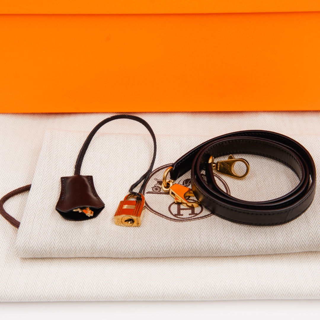 Hermès Kelly 32 Bag in Black Box Calfskin Leather with Gold Hardware - Gemaee  UAE