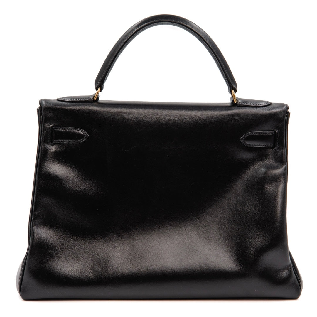 Hermès Kelly 32 Bag in Black Box Calfskin Leather with Gold Hardware - Gemaee  UAE