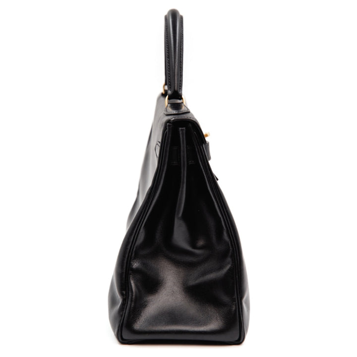 Hermès Kelly 32 Bag in Black Box Calfskin Leather with Gold Hardware - Gemaee  UAE