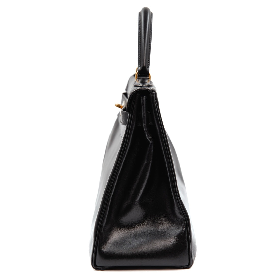 Hermès Kelly 32 Bag in Black Box Calfskin Leather with Gold Hardware - Gemaee  UAE