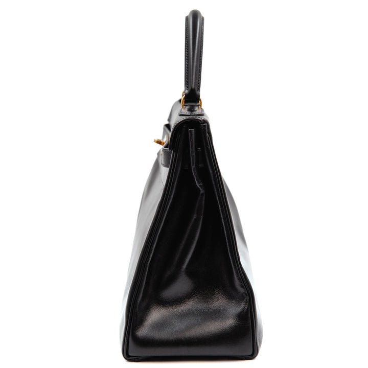 Hermès Kelly 32 Bag in Black Box Calfskin Leather with Gold Hardware - Gemaee  UAE
