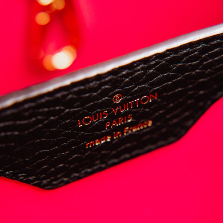 Louis Vuitton Capucines MM Black Taurillon Leather Iconic Top Handle Bag - Gemaee  UAE