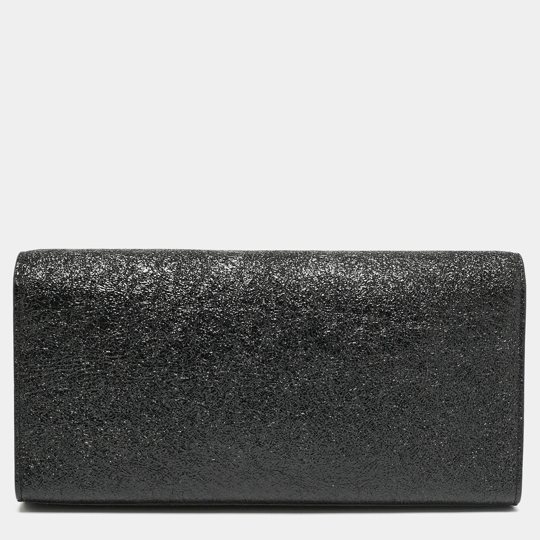 Saint Laurent Cassandre Tassel Clutch in Black Ceramic Effect Leather
