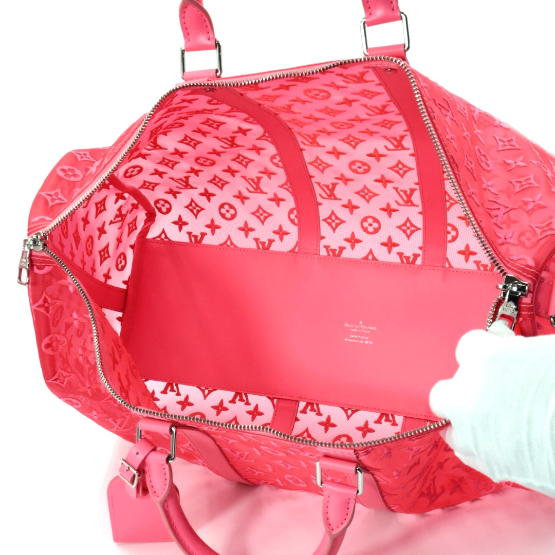 Louis Vuitton Keepall Bandoulière 50 in Fuchsia Monogram Mesh with Silver Tone Hardware